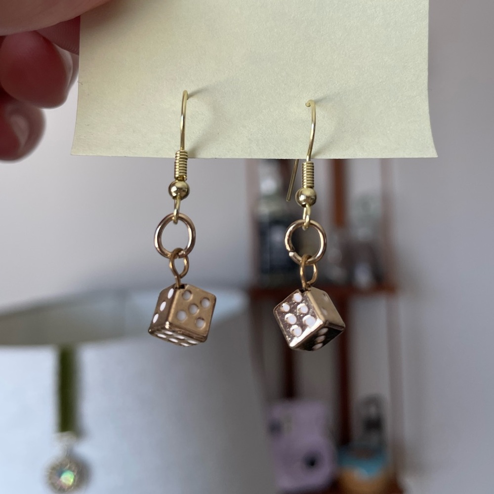 Gold colored dice earrings with hooks